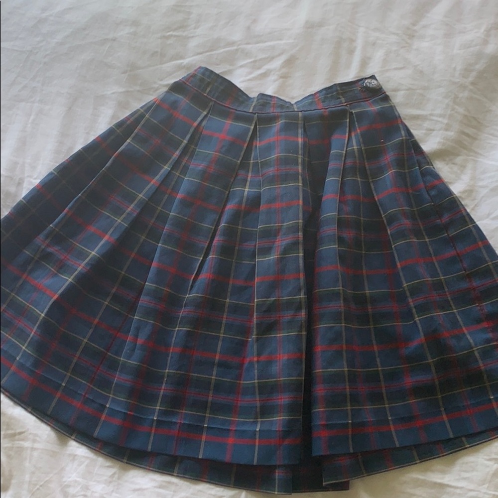 Blue plaid skirt.